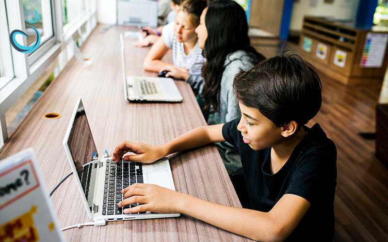 Students following AI-designed personalised education plans in class