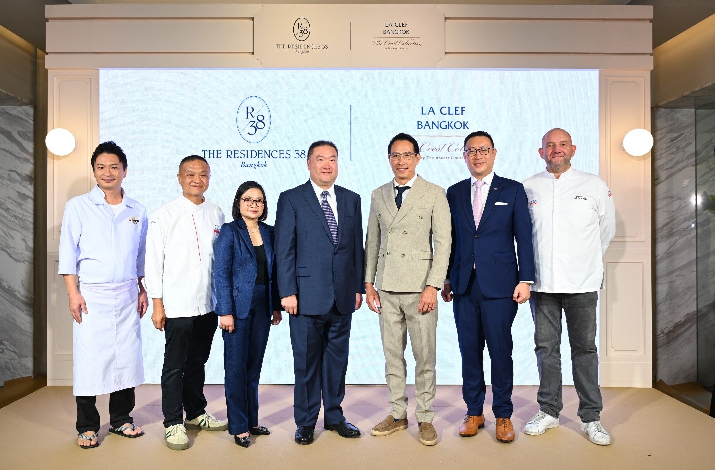 In the photo (from left to right): 1. Chef Takashi Sasaki, Kappo Takashi 2. Chef Wai Yin Man, Chef Man Private Kitchen 3. Miss Soraya Sathiengoset, Acting Chief Executive Officer, Rabbit Holdings 4. Mr. Kavin Kanjanapas, Chief Executive Officer, BTS Group Holdings 5. Mr. Chanond Ruangkritya, Chief Executive Officer, Ananda Development 6. Mr. Kanit Sangmookda, Country General Manager, Thailand & Laos, The Ascott Limited 7. Chef Arnaud Dunand Sauthier